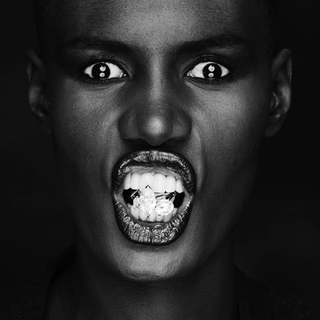 Illustration for article titled Why Photograph A Black Woman In A Cage?